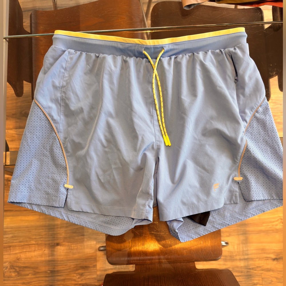 Light Blue Athletic Shorts with Yellow Accents